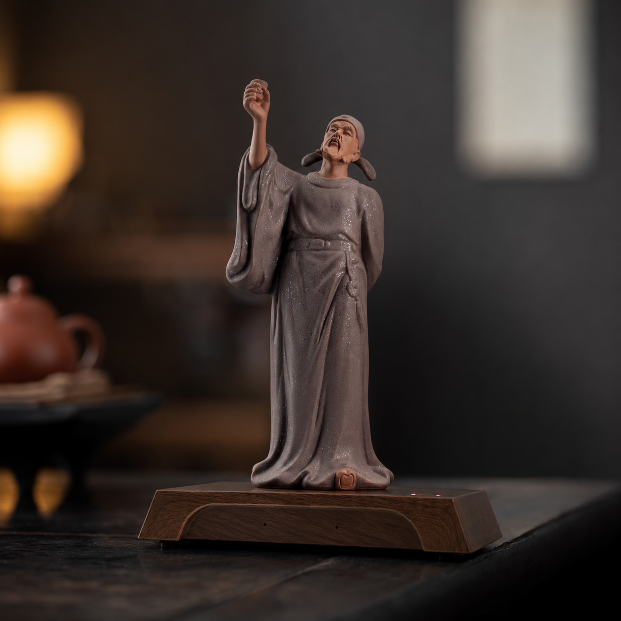 Li Bai AI figurine in long robes, raising a cup and looking upward, standing on a dark wooden base